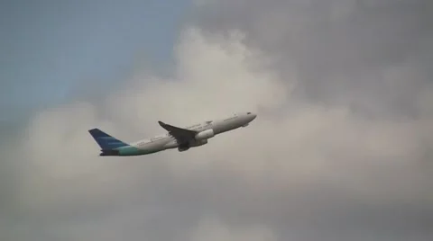 Garuda Indonesia plane in flight Stock Footage