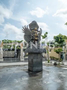 Garuda Wisnu Kencana GWK Bali monument at sunny day with blue sky and clouds Stock Photos