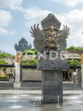 Garuda Wisnu Kencana GWK Bali monument at sunny day with blue sky and clouds Stock Photos