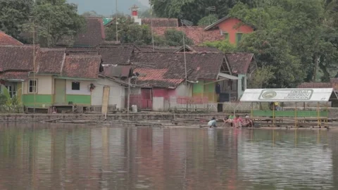 Garut, West Java, Indonesia - Cangkuang Temple Lake and Bamboo Barges Video stock 195930543