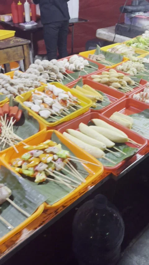 Garut, West Java, May 24, 2025, grilled seafood traders present various types of Stock Footage 310181897