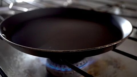 Gas; 4K. cooking; preparing; pot; frying pan, kitchen-stove; Stock Footage 100969693