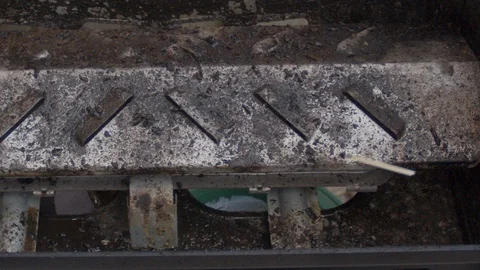 Gas barbecue igniting by thrown match in slow motion Stock Footage 127699113