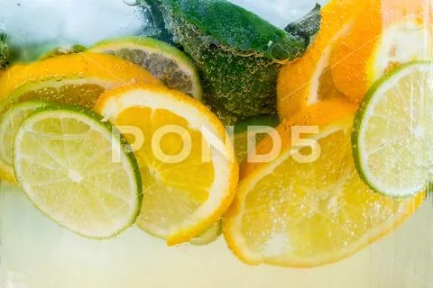Gas bubbles in the carbonated beverage. Lemonade cocktail. Gases, carbon diox Stock Photos