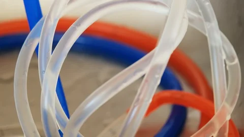 Gas bubbles move in liquid along curved tubes Stock Footage 129849255