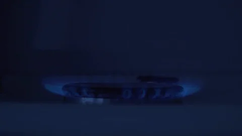 Gas burner being lighten up in darkness Stock Footage 101885535