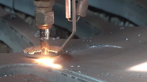 Gas burner of cnc machine cutting metal sheet with sparks. Stock Footage 120752465