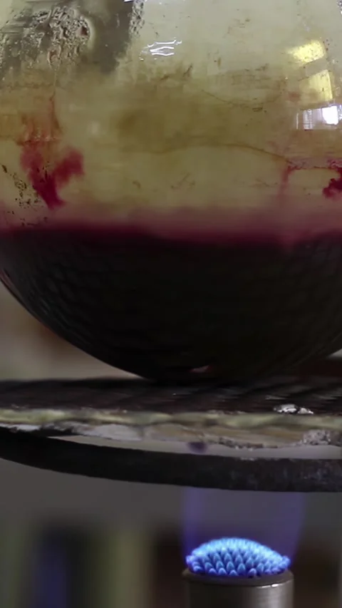 Gas Burner Heating Solution in School Laboratory - Close-Up - Vertical View Stockbeeldmateriaal 296542511