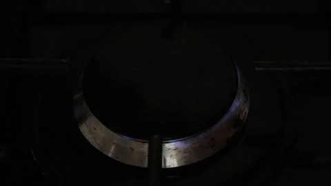 Gas burner igniting and burning then turning off Stock Footage 297458089