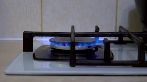 Gas burner in the kitchen 4K Stock Footage 218373876
