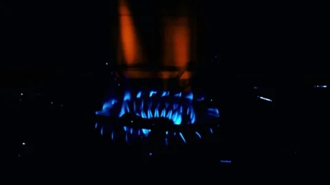 Gas burning from a kitchen gas stove. gas on black background. fire on blac.. Stock Footage 293485201