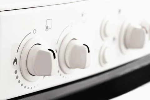 Gas cooker stove knobs in close up . Perillas de estufa de cocina a gas de .. Stock Photos