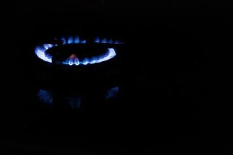 Gas flame in the dark Stock Photos