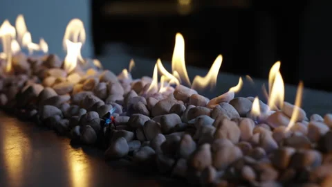 Gas flames on white rocks Stock Footage 267615823