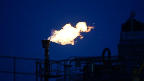 Gas flare stack burning excess gases at petrochemical plant selby united kingdom Stock Footage 125016170