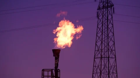 Gas flare stack burning excess gases at petrochemical plant selby united kingdom Stock Footage 125017160