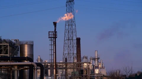 Gas flare stack burning excess gases at petrochemical plant selby united kingdom Stock Footage 125020514