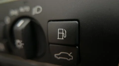 Gas fuel lid opened from inside modern car (Volvo V70) Video stock 53852596