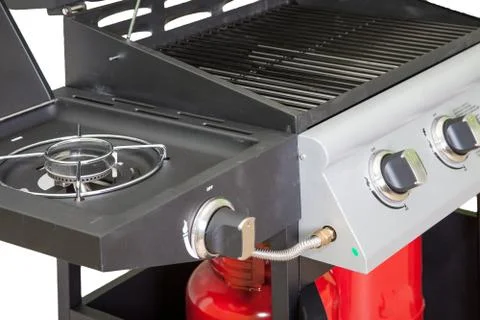 Gas grill closeup on white background Stock Photos