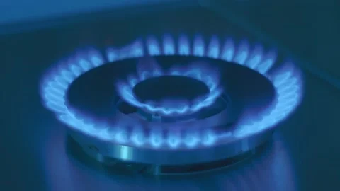 Gas ignites on large and powerful burner and gas burns with many bright sparks Stock Footage 297789156