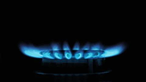 Gas Ignition on the Burner on a Dark Background, Close-up Stock Footage 171619280