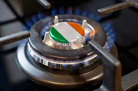 Gas import and export concept. A burning gas burner of a home stove, in the m Stock Photos