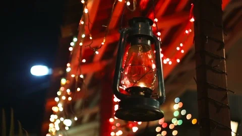 Gas lamp on Abstract lights background. Colourful festoons, New Year Lighting Stock Footage 89684240