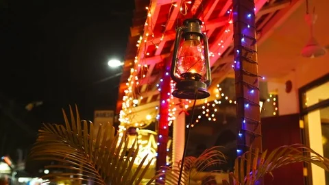 Gas lamp on Abstract lights background. Colourful festoons, New Year Lighting Video stock 89684302