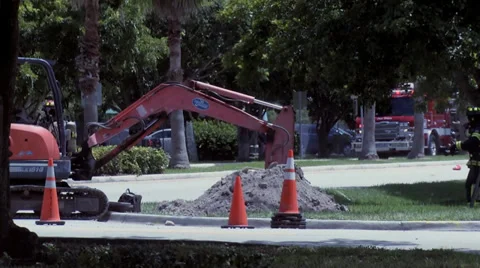 Gas main break firemen bringing firehose 動画素材 27866613