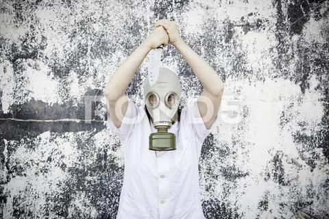 Gas mask girl with knife, danger and halloween Stock Photos