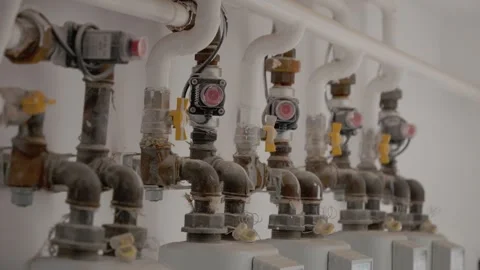 Gas meter and pipe installation in staircase of flat building Stock-Footage 347203210