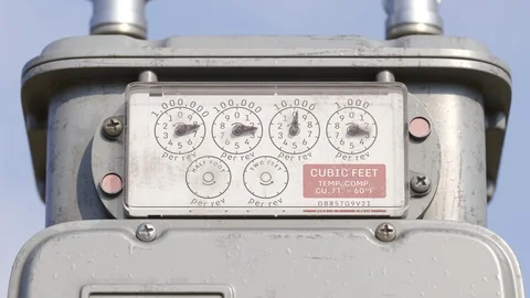 "A gas meter gauges in closeup camera. Fast fuel flow shown in a timelapse. Stock Footage 97960248