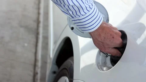 GAS NOZZLE INSERT INTO CAR  Video stock 2177848