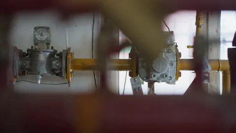 Gas products distribution pipe with knots and pressure meter Stock Footage 243303553