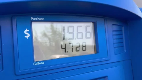 Gas pump digital display increasing purchase amount and gallons Stock Footage 340469541