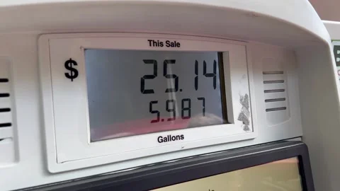 Gas Pump Digital Display Screen Running Up Price and Gallons Close Up Stock Footage 344690171