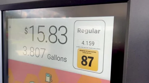 Gas Pump Display Showing Dollar Amount and Gallons Meter Rising Stock Footage 347317208