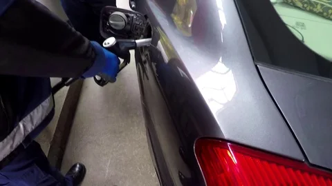 At The Gas Pump Vídeo Stock 70585357