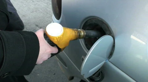 Gas pump nozzle in action Stock Footage 352078