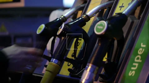 Gas pump nozzle at night Stock Footage 46168066