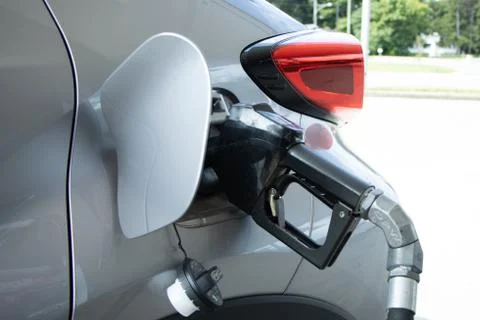 Gas pumping into car 库存照片
