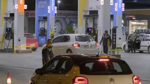 Gas queue of vehicles at the gas station before the big raise of the prices Stock Footage 167102975