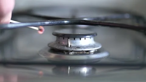 Gas Ring on Cooker Ignite with Match, Slow Motion, Close Up  Stock Footage 62414666