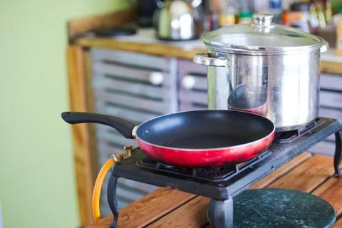 Gas stove and frying pan Stock Photos