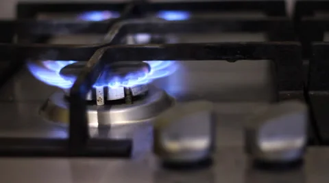Gas stove with a burning flame Stock Footage 44283346