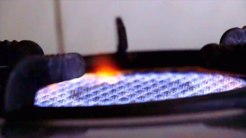 Gas stove lighting up Stock Footage 108972556