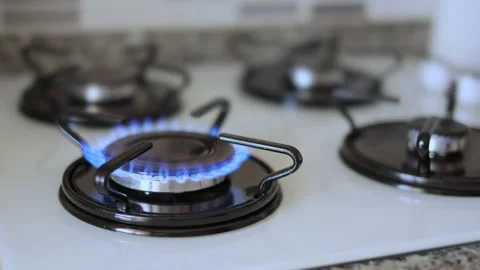 Gas stove lit for cooking. blue fire, fu... | Stock Video | Pond5