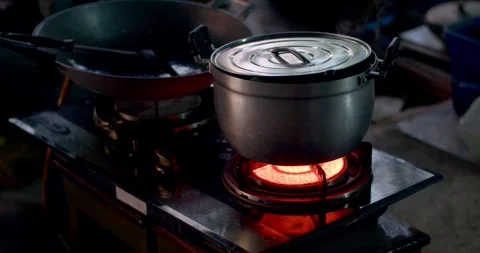 The gas stove was turned on for a while, causing it to overheat until it turned  Stock Footage 254198117