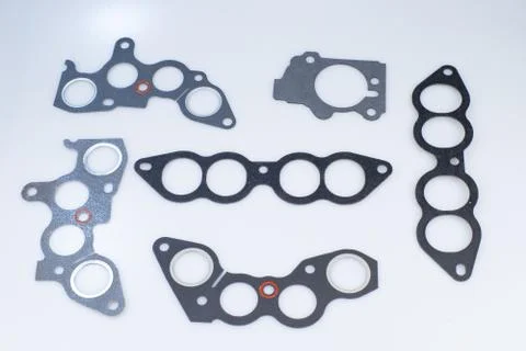 Gaskets for the motor of the car of different sizes. Stock Illustration