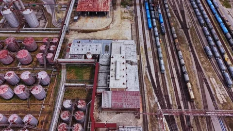 Gasoline production facility with storage tanks and rail lines Stock Footage 342607589